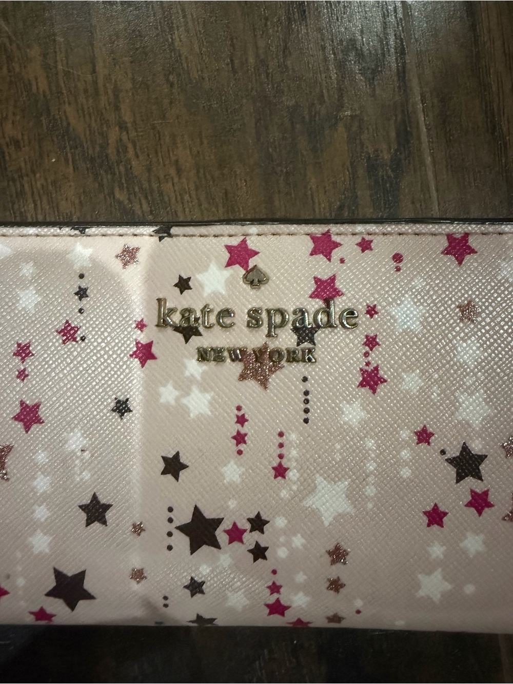 NWOT Kate Spade Pink Star Print Zip Wallet with Metallic Logo